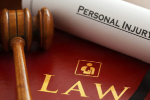 A personal injury law book in a law firm owned by attorneys in Dallas, TX.